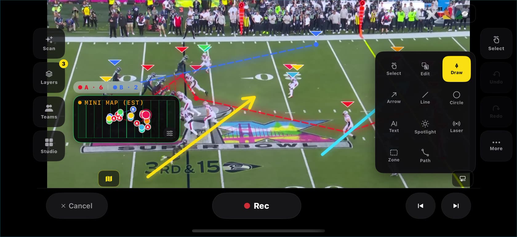 Drawing tools open over a frozen American football frame with a yellow arrow and cyan line annotation